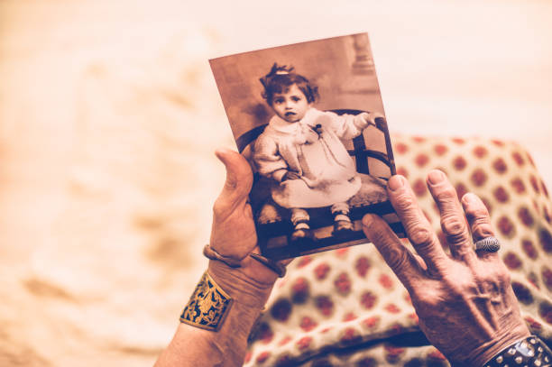 istock Senior Woman Close Up Hands Holding Memories 653772964