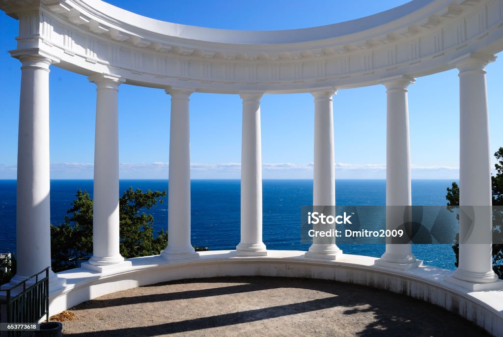 Arbor and columns against the sea Ancient Stock Photo