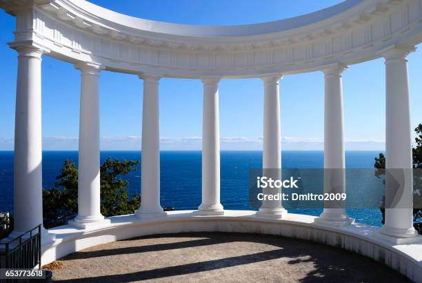 Arbor And Columns Against The Sea Stock Photo - Download Image Now - Ancient, Arcade, Arch - Architectural Feature