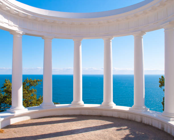 Arbor and columns against the sea