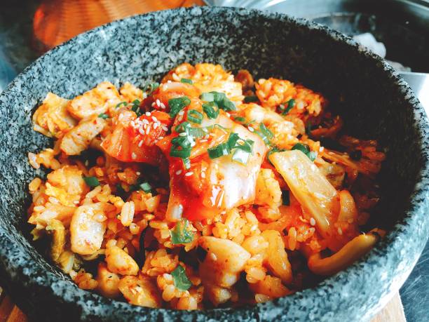 Hot bowl of Kimchi rice in Korean style