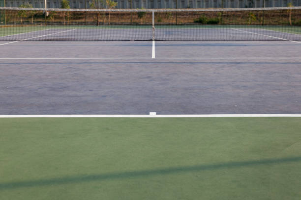 istock tennis court on sunny day 653774700
