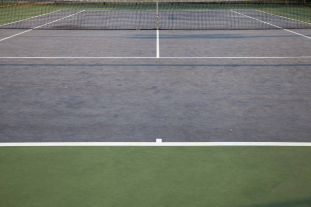 istock tennis court on sunny day 653774996