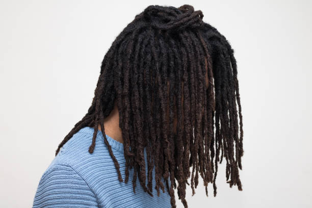 istock hair in blue sweater 653775706