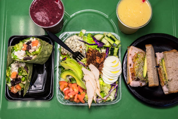 istock Healthy Wrap Sandwich Smoothie And Cobb Salad 653779210
