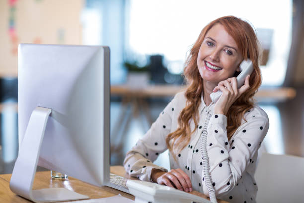 istock Creative businesswoman talking on telephone 653785422