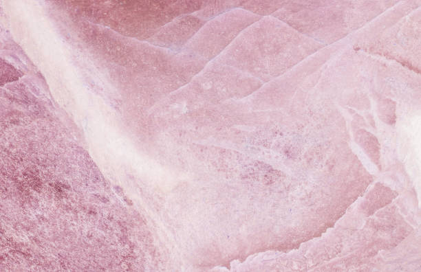 Closeup surface abstract marble pattern at the red marble stone floor texture background