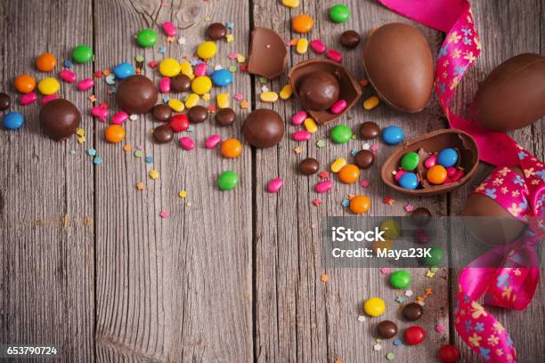 Chocolate Easter Eggs Over Wooden Background Stock Photo - Download Image Now - Aging Process, Backgrounds, Belarus