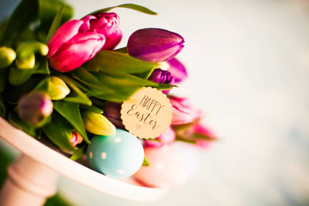 istock Easter arrangement with tulips and eggs 653791876