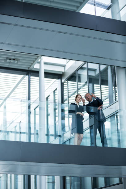 istock Businessman talking with colleagues 653794616