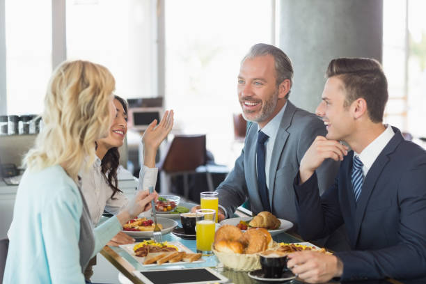 istock Business people having meal in restaurant 653796304