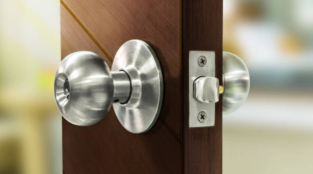 istock Door Knobs on wooden door 653798980
