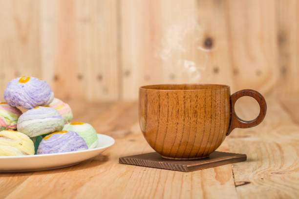 istock cup of coffee with wood background 653799078