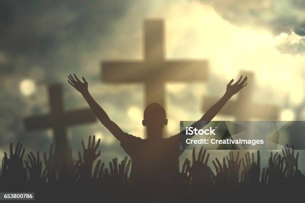 Prayers Hand With Three Cross Symbols Stock Photo - Download Image Now - Praying, Religious Cross, Christianity