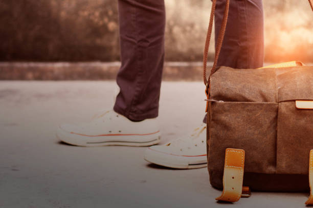 istock Pockets of tourists on the concrete. 653800854