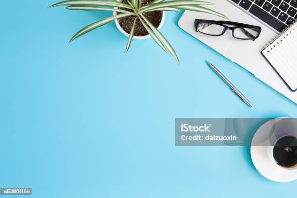 Office Supplies Stock Photo - Download Image Now - Blue, Desk, Laptop
