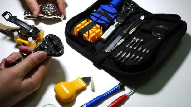 istock Person replacing hand watch batteries 653803208