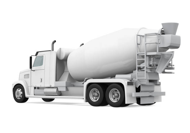 Cement truck on a highway delivering a load of concrete. Distortion from heat rising from highway can be seen on horizon. Focus on truck with blurred foreground.