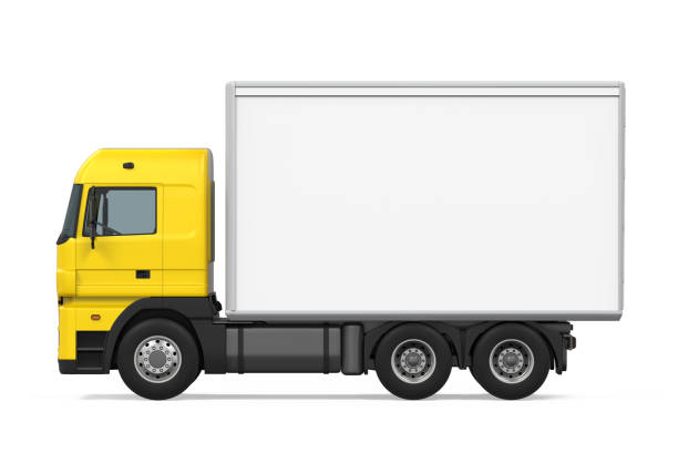 yellow lorry with trailer passes Deggendorf on the A3 motorway, background Bavarian Forest, Lower Bavaria, Germany