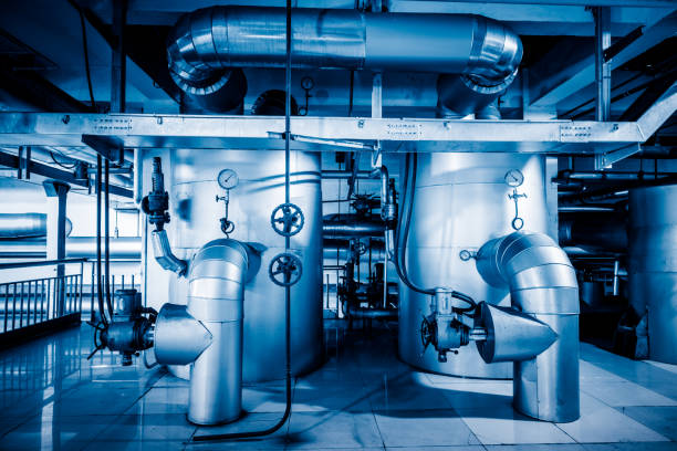 istock steel pipelines and cables in a plant 653820992