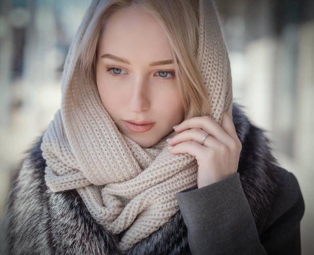 istock Woman at sunny winter day. 653821182
