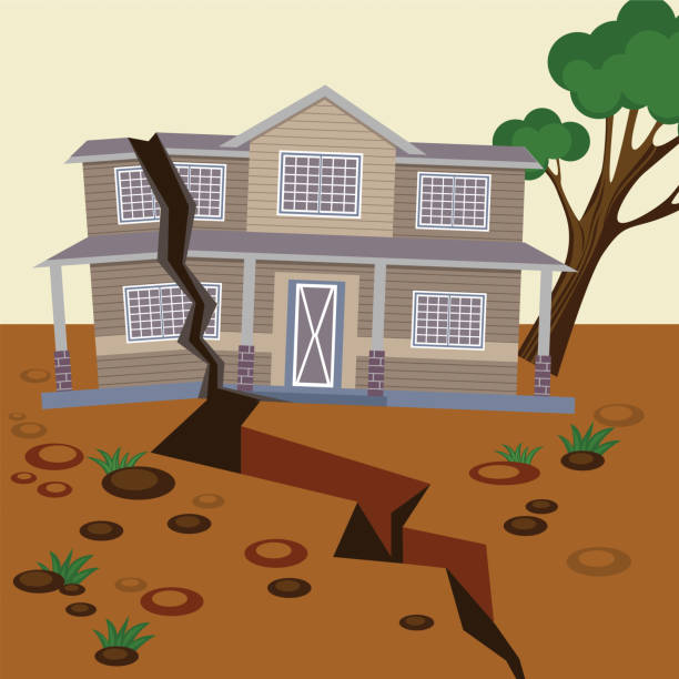 Earthquake damaged house and ground splitted in two parts Earthquake damaged house and ground splitted in two parts. Natural disaster destroyed environment and residential building. Vector illustration of broken home and land with stones, falling tree tremont stock illustrations