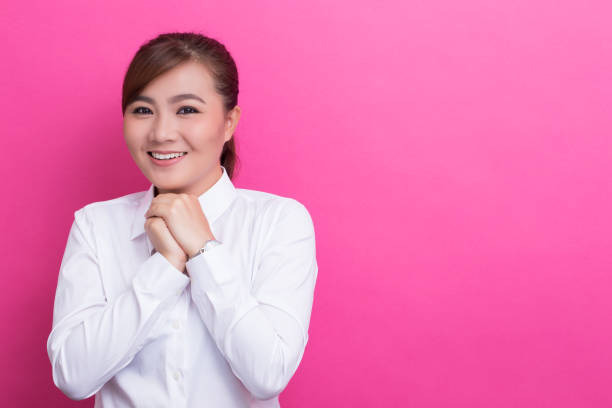 istock Asian woman feel shy and smiling 653823376