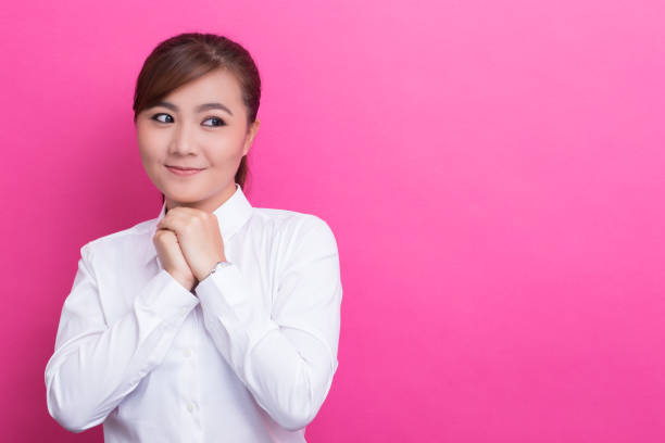 istock Asian woman feel shy and smiling 653823698