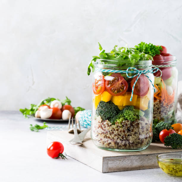 istock Salad in glass jar with quinoa 653827870