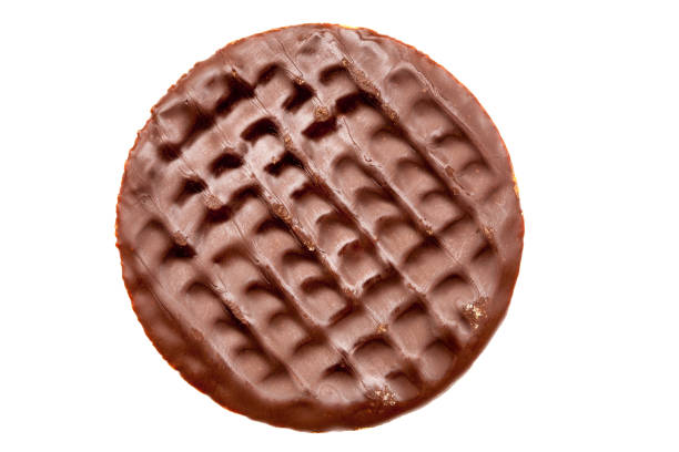 Chocolate digestive biscuit Single chocolate digestive biscuit, from directly above, isolated on white. chocolate cookies stock pictures, royalty-free photos & images