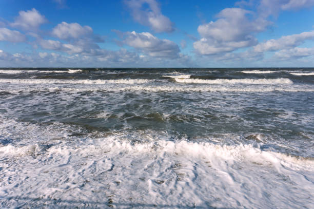 istock waves, storm, Sunny day, sea, clouds 653838988