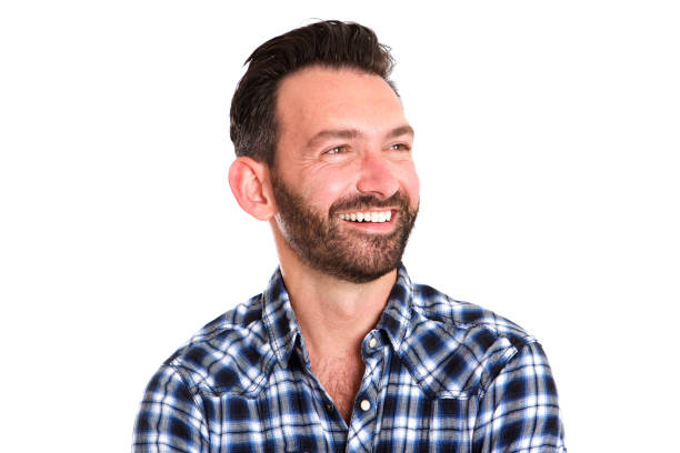istock Happy mature man with beard looking away 653844178
