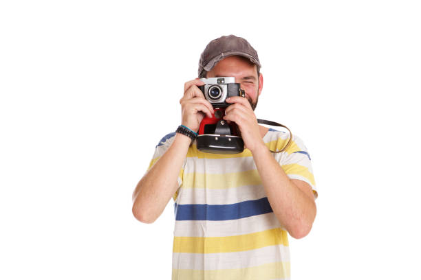 istock Mature man taking pictures with camera 653844338