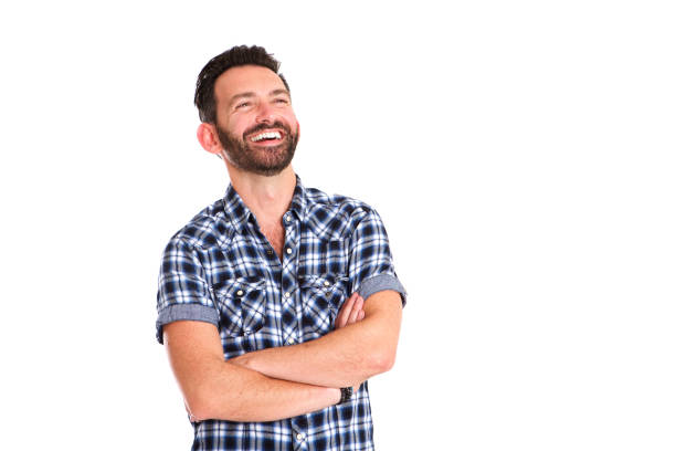 istock Handsome mature man standing with arms crossed and smiling 653844500