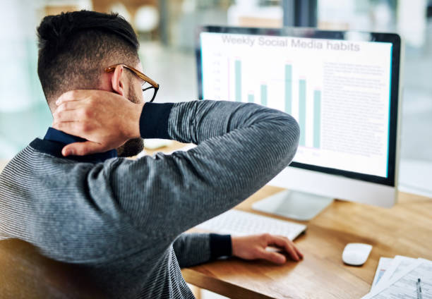 istock Feeling the strain and tension creep into his neck 653850594