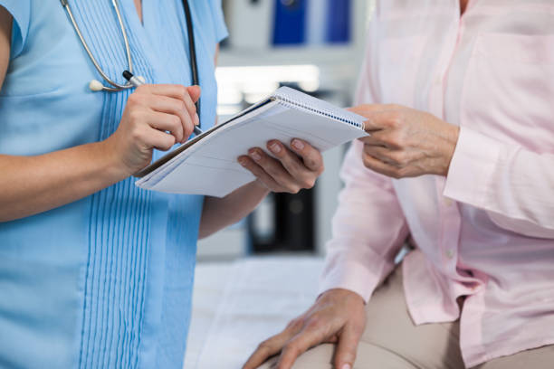 istock Doctor showing prescription to patient 653851082