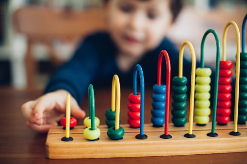 Little boy with abacus