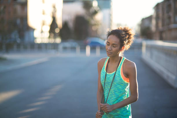 istock Exhousted woman after rope jumping 653857176