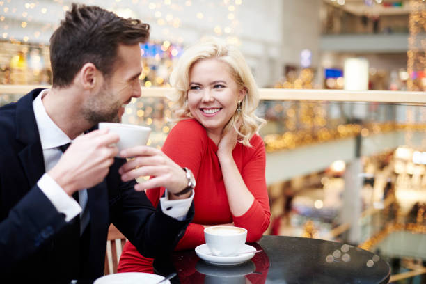 istock Couple having a date on the shopping centre 653862588