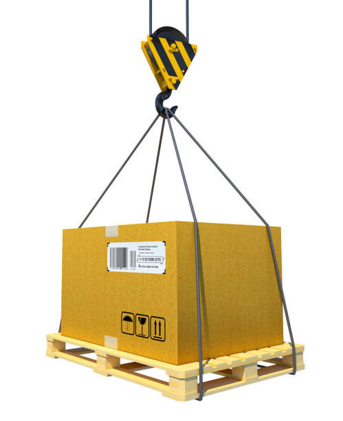 istock Pallet with cardboard lifted by crane 653870548