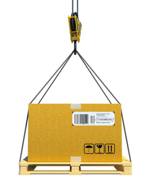 istock Pallet with cardboard lifted by crane 653870572