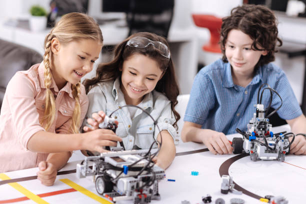 istock Positive children enjoying science at school 653873254