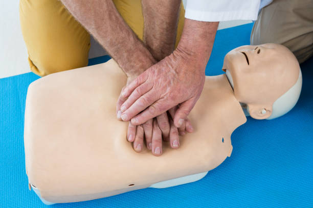 istock Paramedics training cardiopulmonary resuscitation to man 653874110