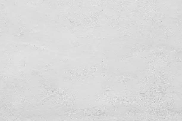 Photo of Seamless white painted concrete wall texture - background