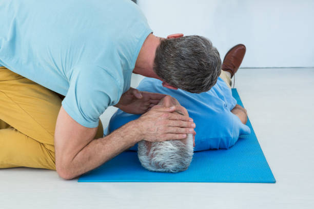 istock Paramedic performing resuscitation on patient 653874692
