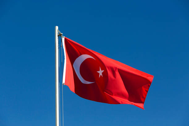 istock National flag of Turkey on a flagpole 653875052