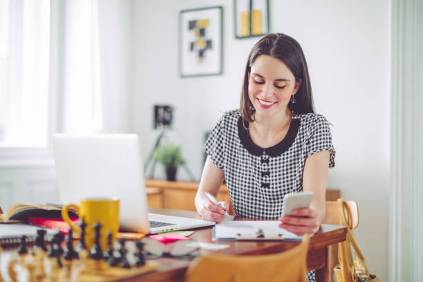 istock Young woman working at home 653876166