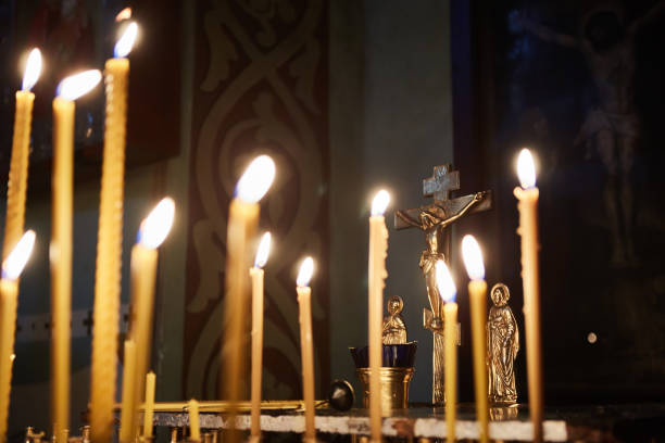 istock candles in orthodox church 653876414