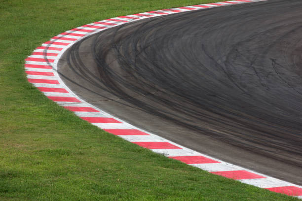 istock Race track curve road 653877078