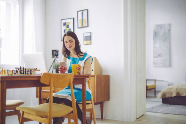 istock Young woman working at home 653880144